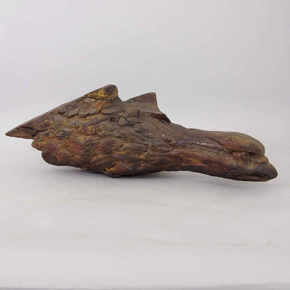 KUTTERSMYCKE, trä, i form av örnhuvud.