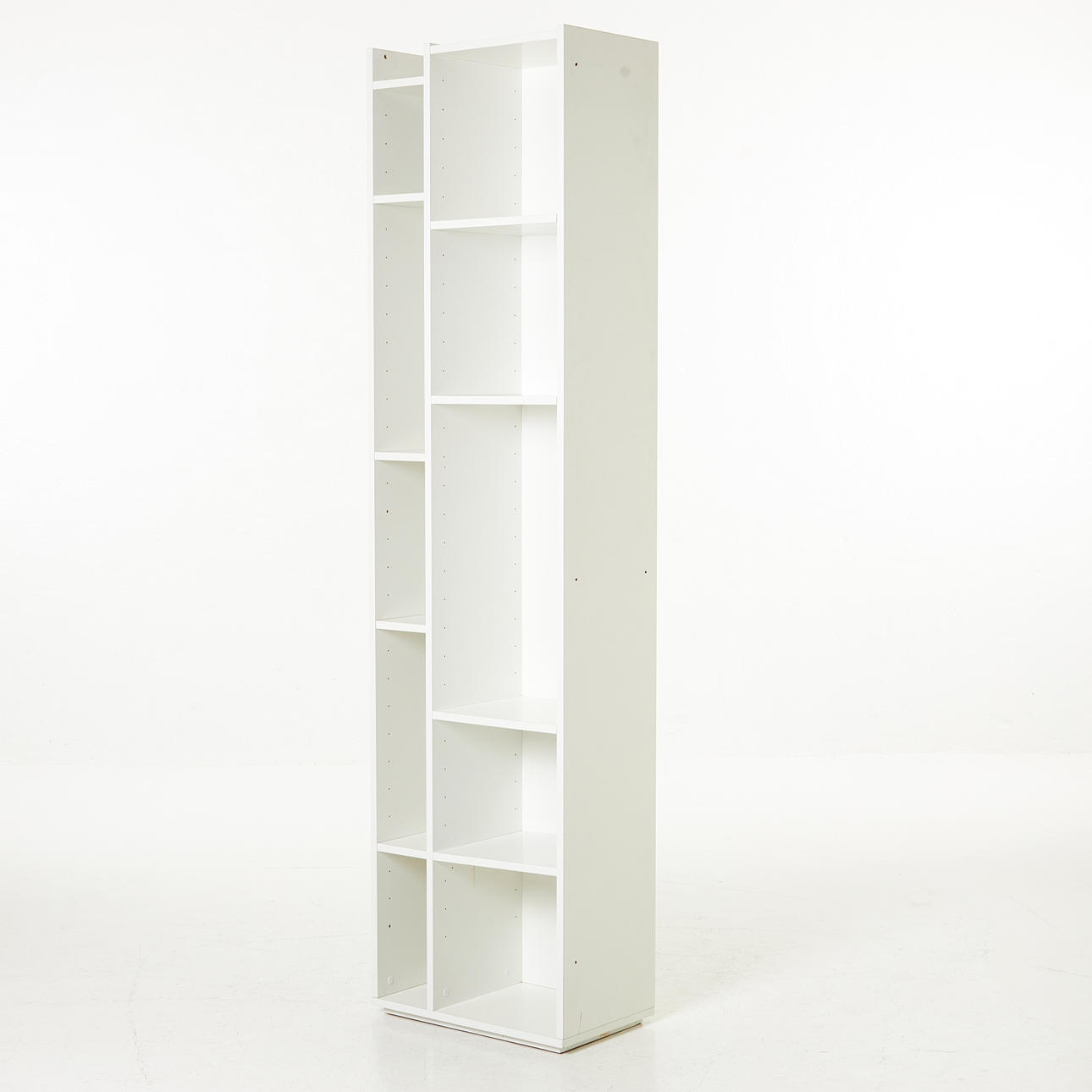 BOOKSHELF, white lacquered, with compartments in different sizes, removable shelves, labeled Made in Denmark, 2000s.