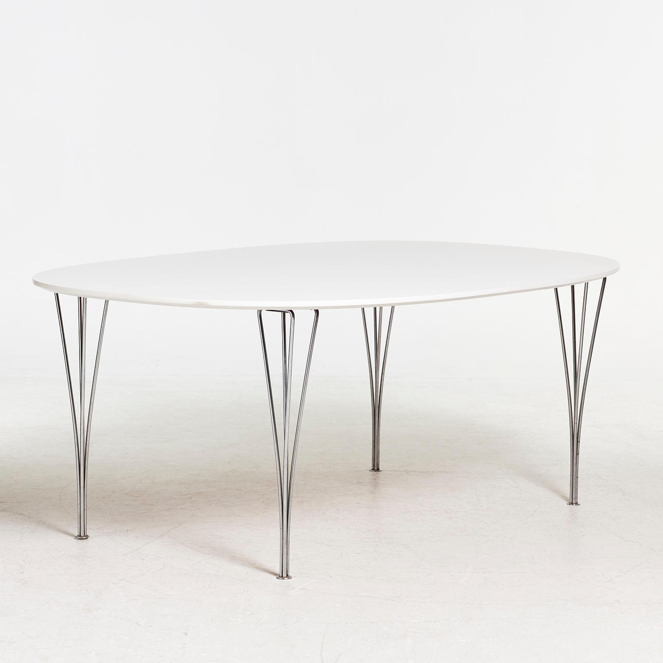 BRUNO MATHSSON/ PIET HEIN. Dining table, ''Superelips'', cherry with white laminate, 4 chrome legs.