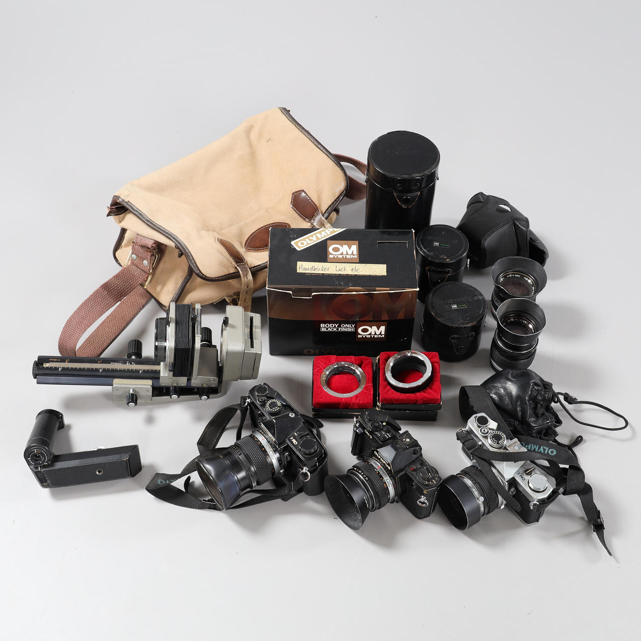OLYMPUS, kamerat ja lisävarusteet OM-järjestelmä.