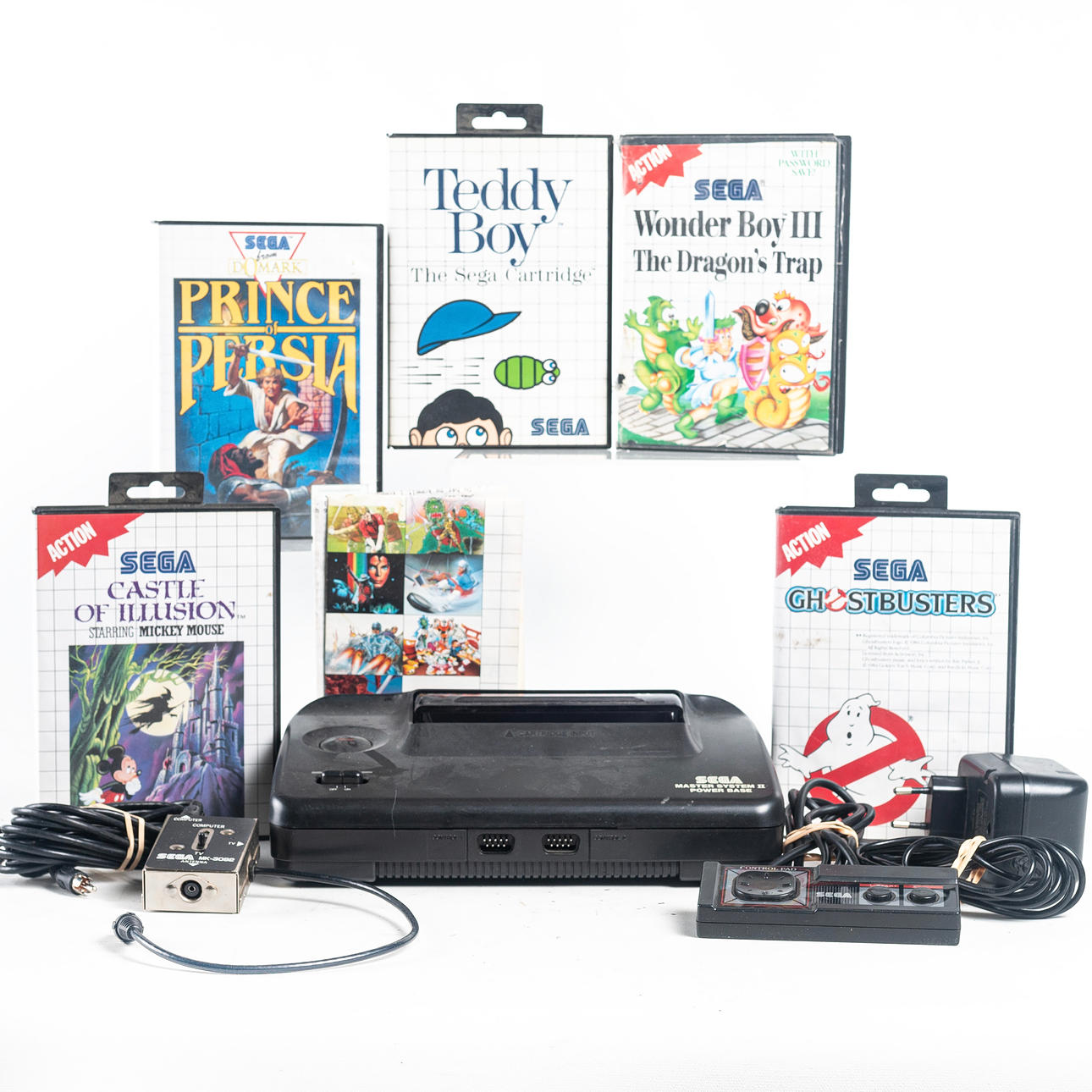 GAME CONSOLE, with 5 games, Sega Master System II.