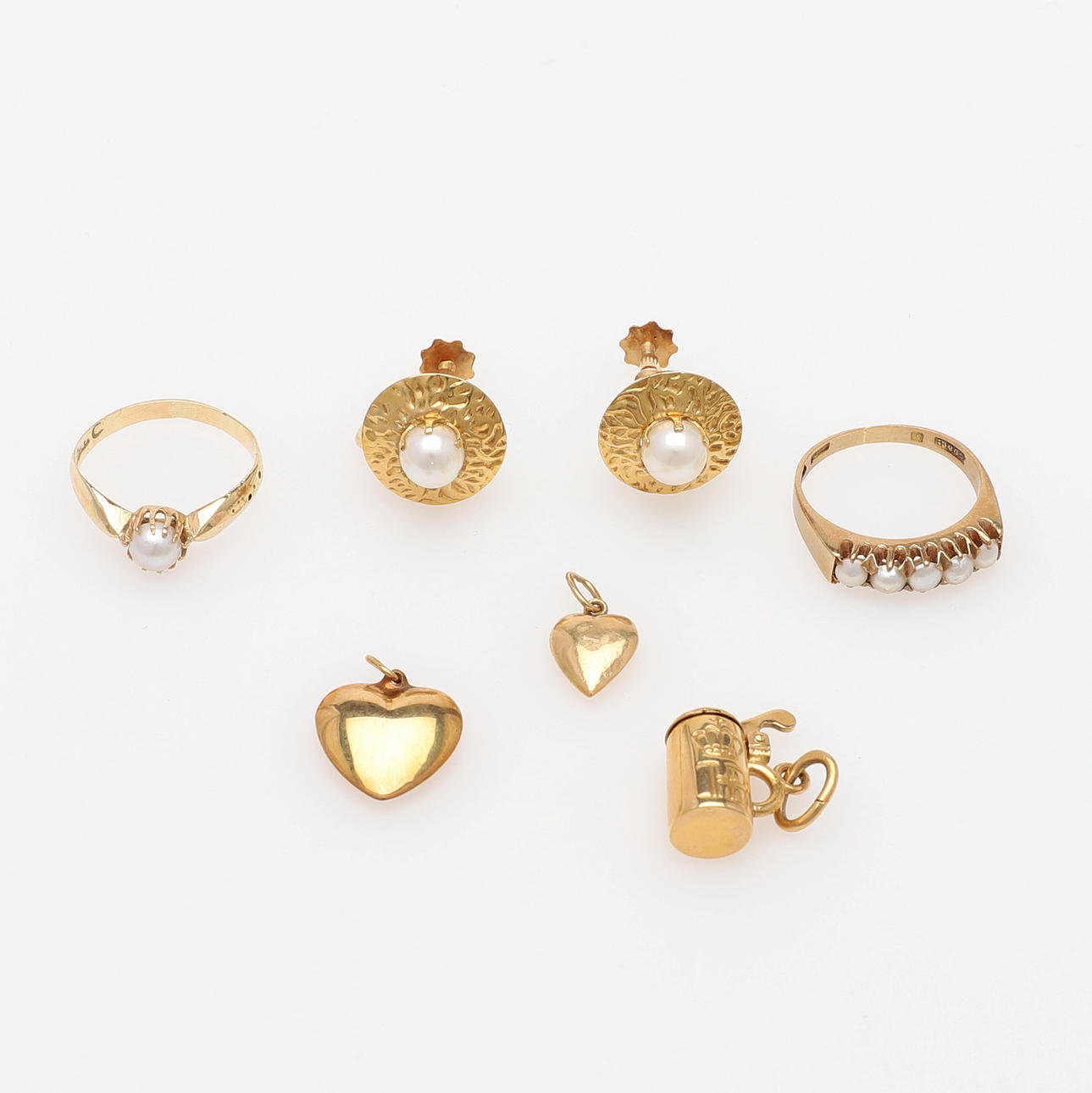 SMYCKEN, SJU STYCKEN, 18K GULD.