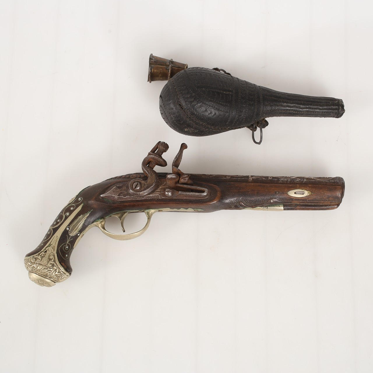 OTTOMAN. Flintlock gun with powder horn.