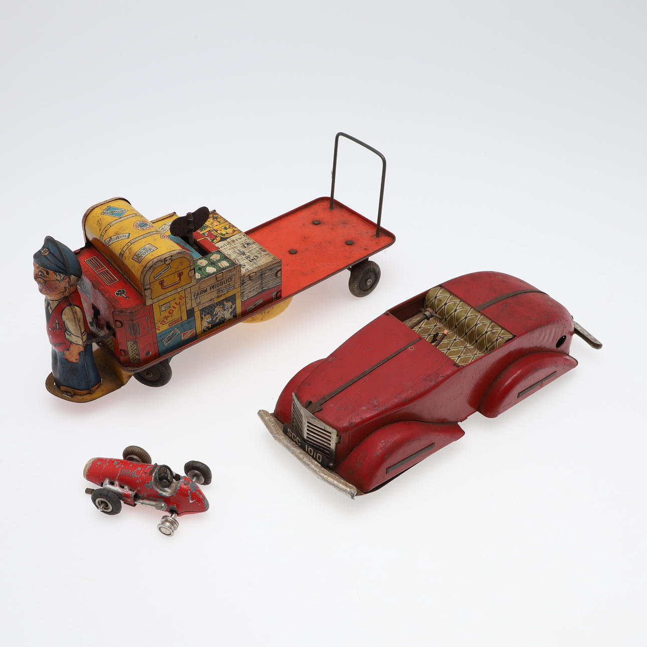CLOCKWORK CAR & ANOTHER CLOCKWORK TOY, & SCHUCO RACING CAR.