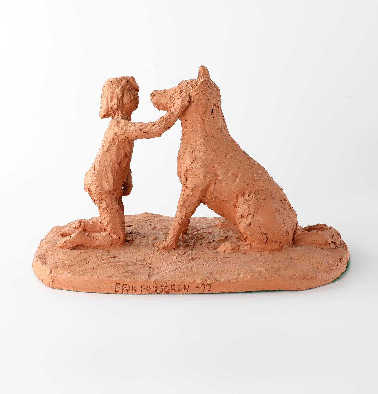 ERIK FORSGREN. Sculpture, Child and dog, terracotta, signed and dated -92.
