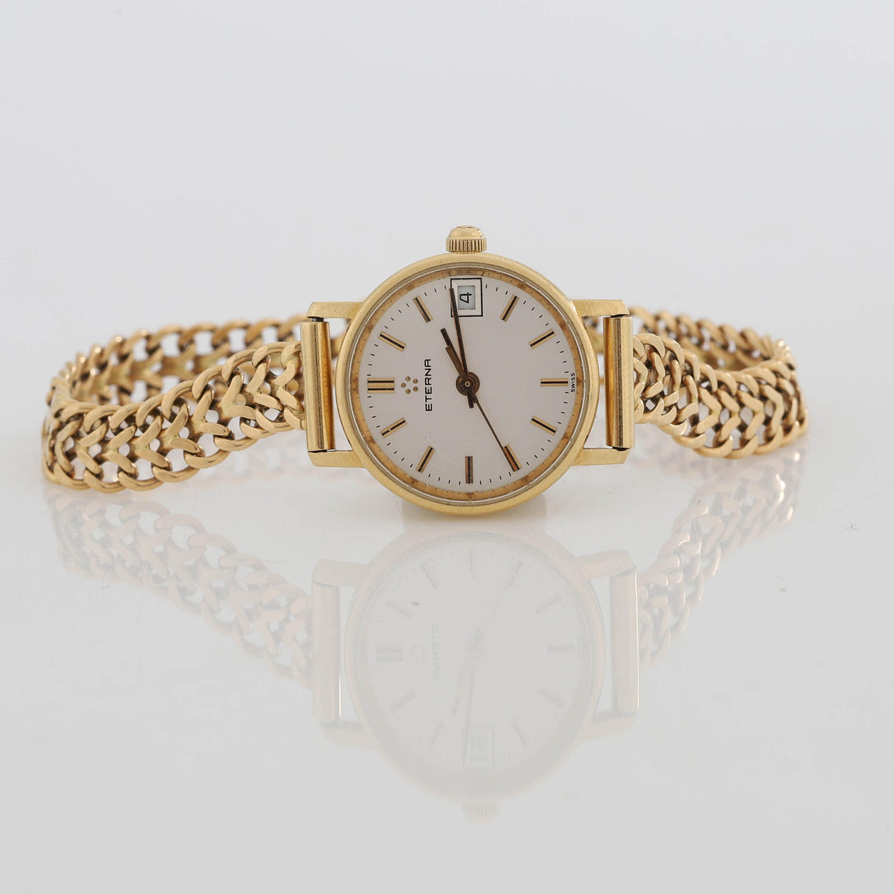 ETERNA, Wristwatch, 18K gold, quartz, date, 1990s.