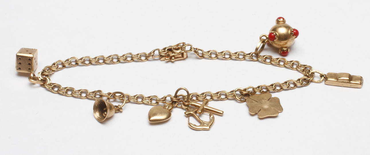 ARMBAND BISMARCK MED BEROCKER, 18k guld, vikt ca 11 gr.