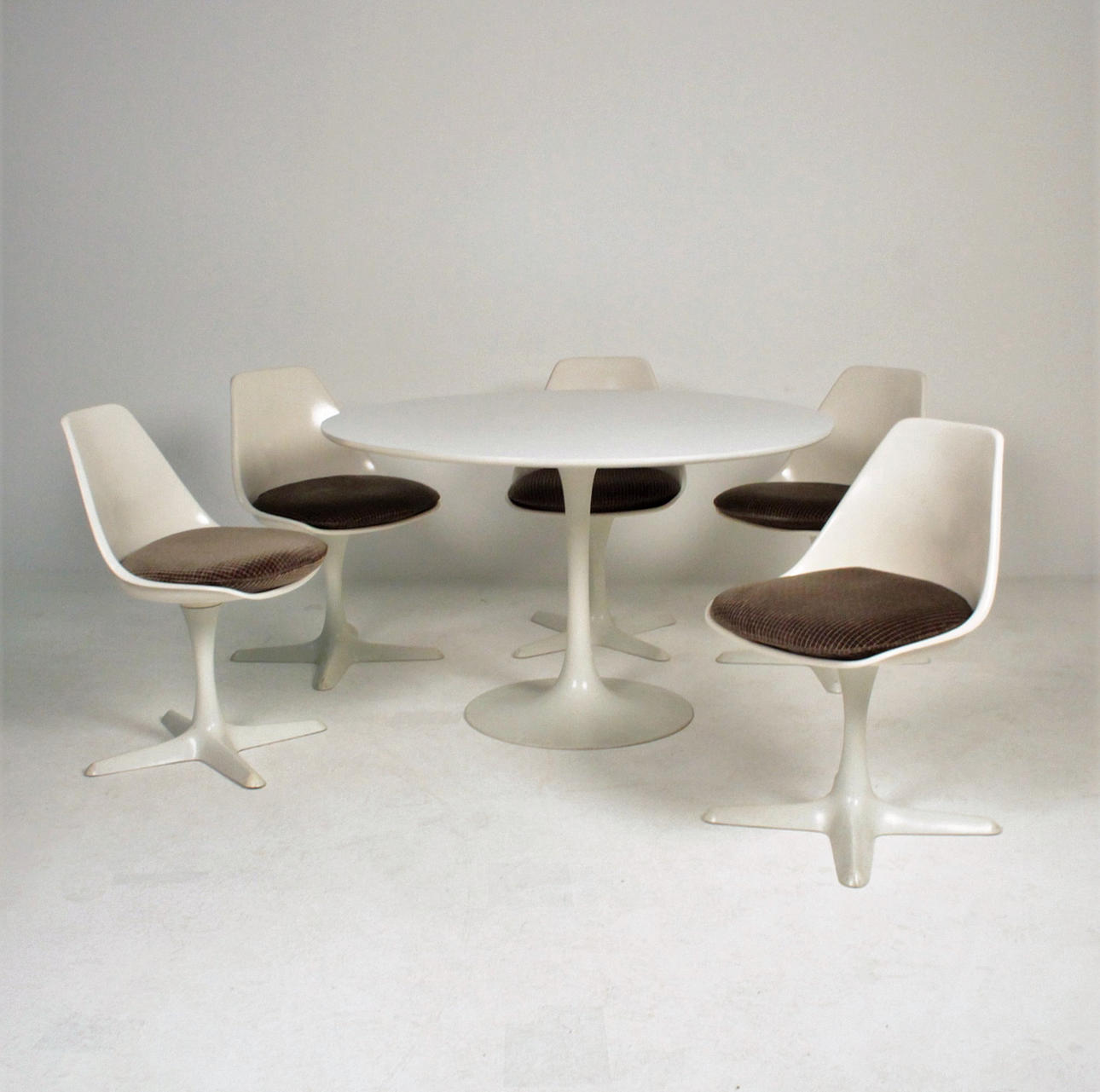 MAURICE BURKE. Tulip dining table group for Arkana.