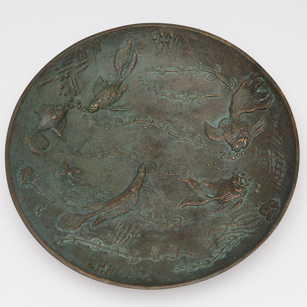 GUNNAR NYLUND. Dish, bronze, fish decoration, monogram signed GN.
