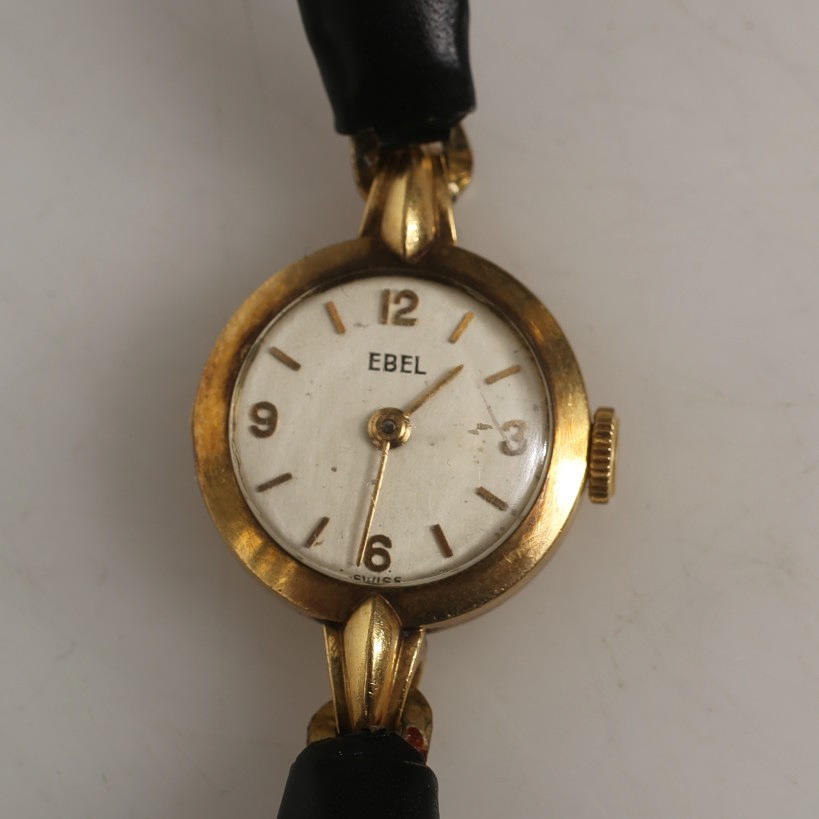 BRACELET WATCH, Ebel, 18k gold with leather strap.