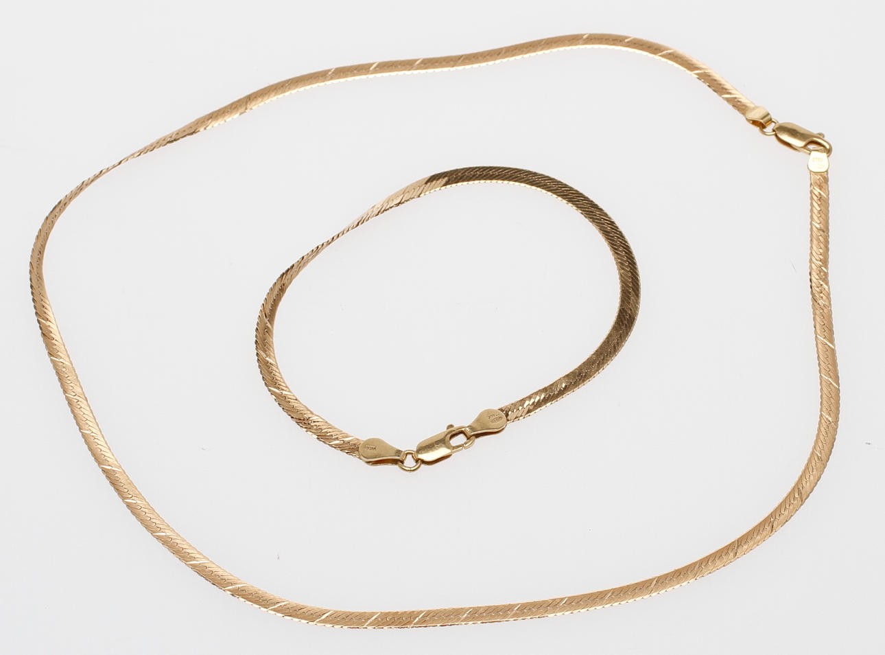HALSBAND samt ARMBAND, 18k guld, vikt ca 11,8 gram.
