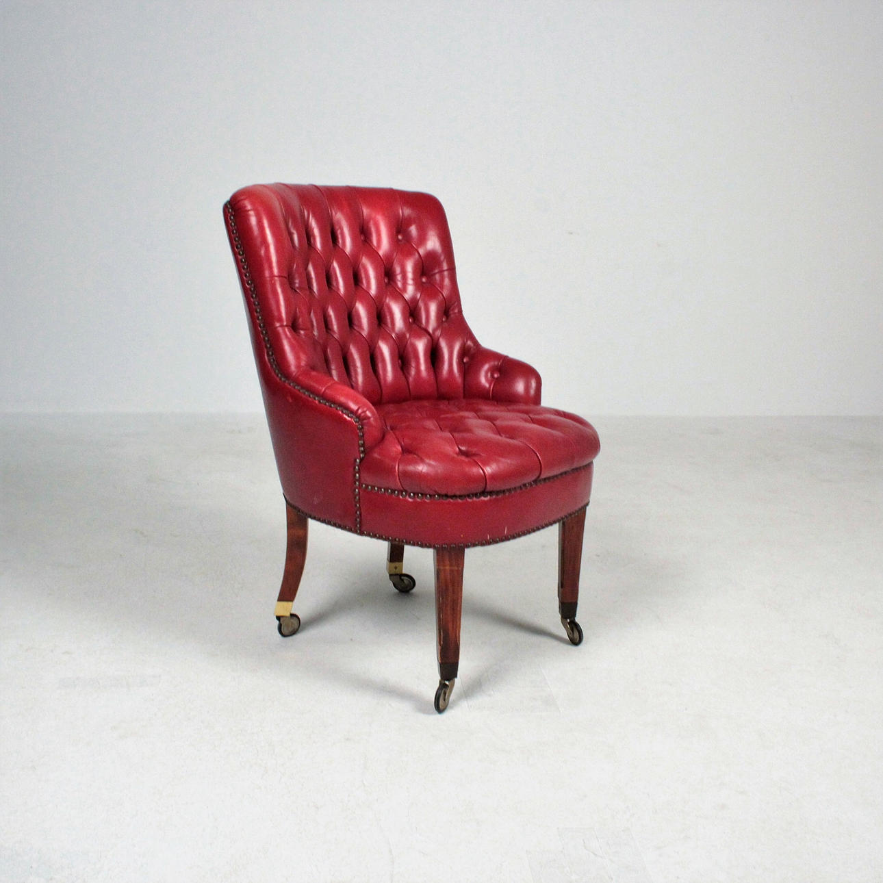 small red club chair.