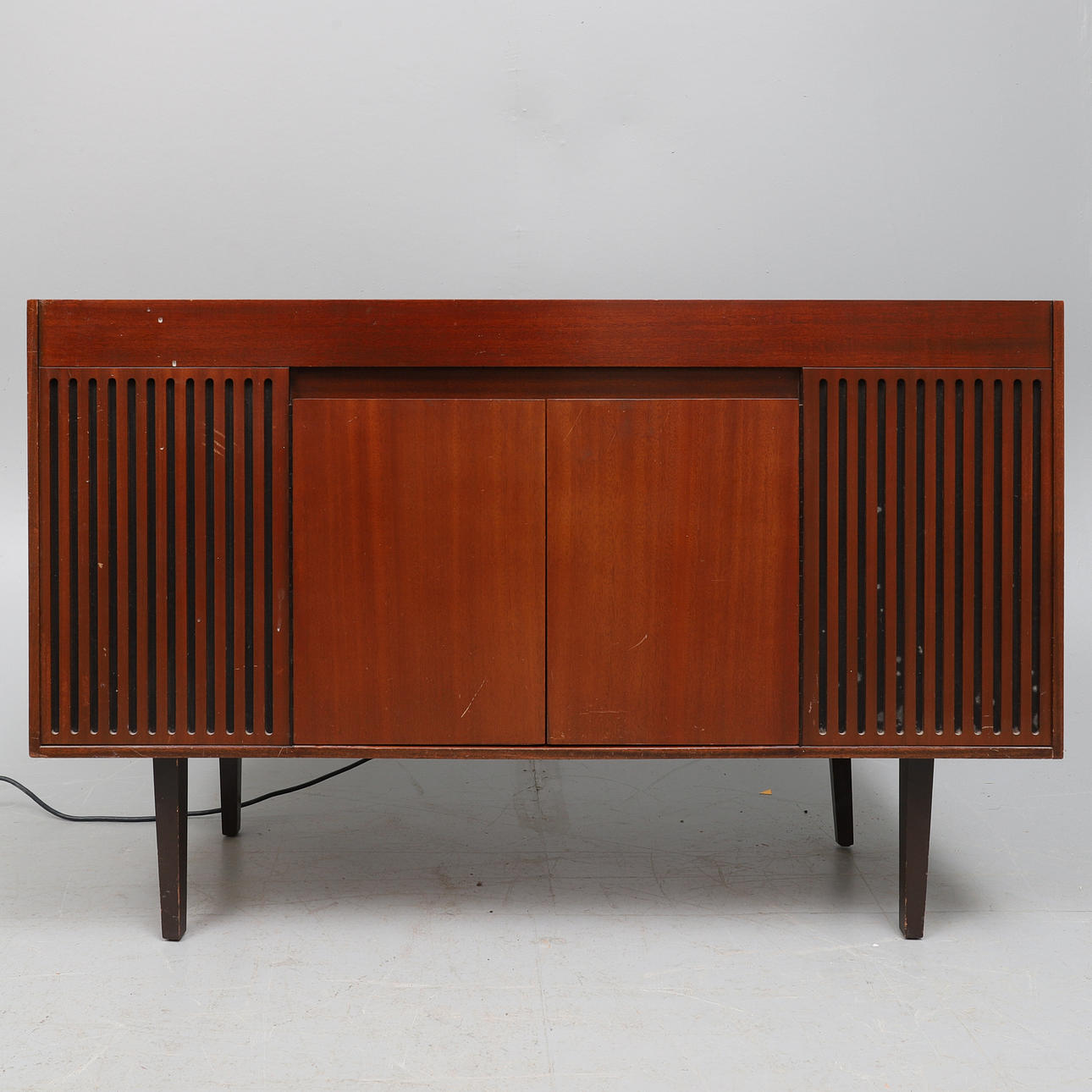 A RETRO MAHOGANY CASED MARCONIPHONE TRANSISTOR STEREOGRAM.