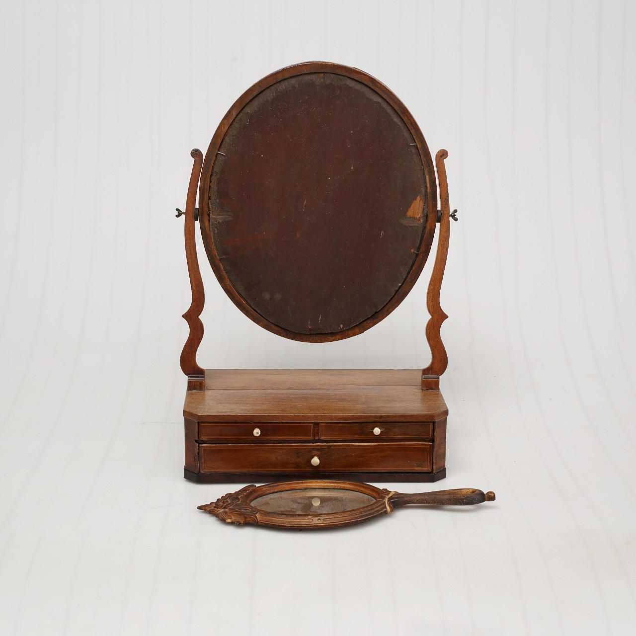 PIG WATCHER AND HAND MIRROR, 19th century.