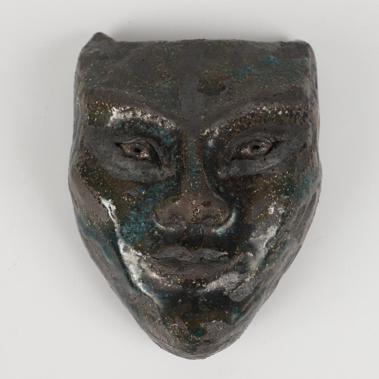 Wall sculpture, face, ceramics, Ulla Pieterek, Helsingborg.