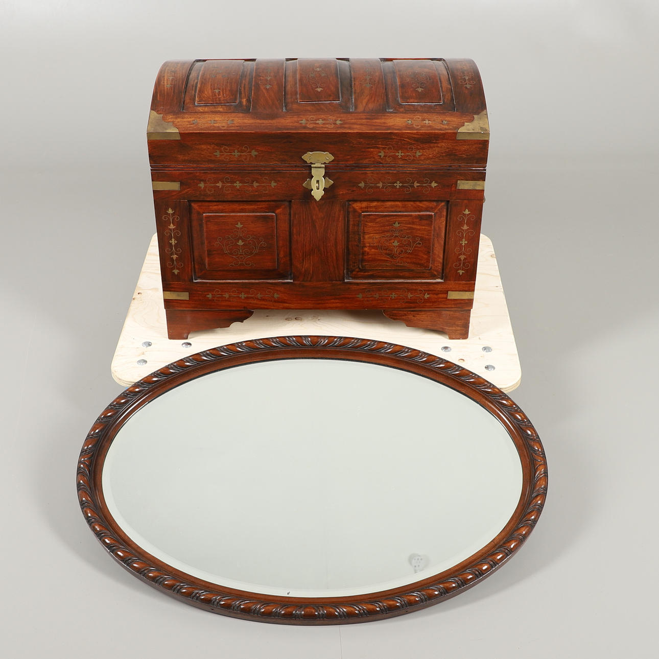 A SMALL MIDDLE EASTERN HARDWOOD DOME TOP CHEST.