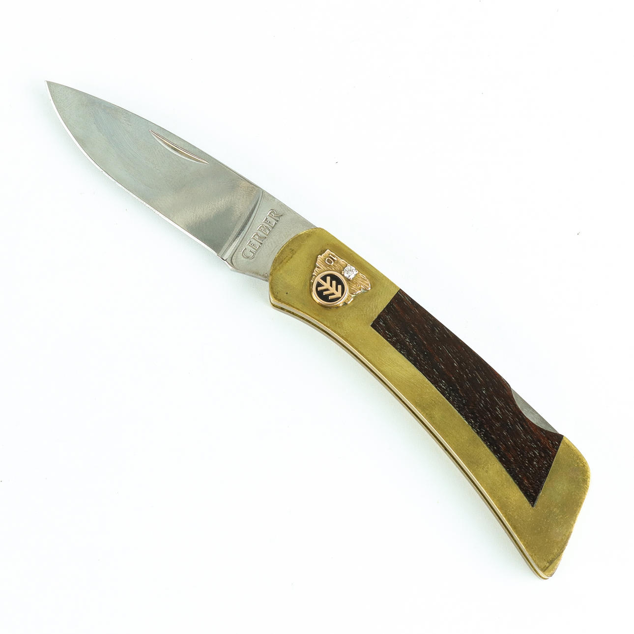 FALLING KNIFE Gerber with embedded diamond.