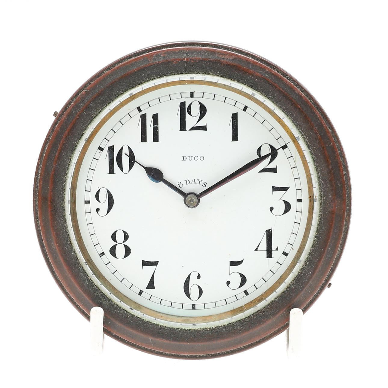 A ENAMEL DIAL BRASS CASE DUCO 8 DAYS CAR CLOCK.