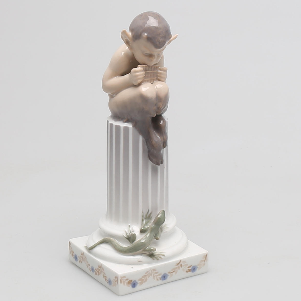 FIGURIN i porslin, Faun på kolonn med ödla, Christian Thomsen, Royal Copenhagen, Danmark.