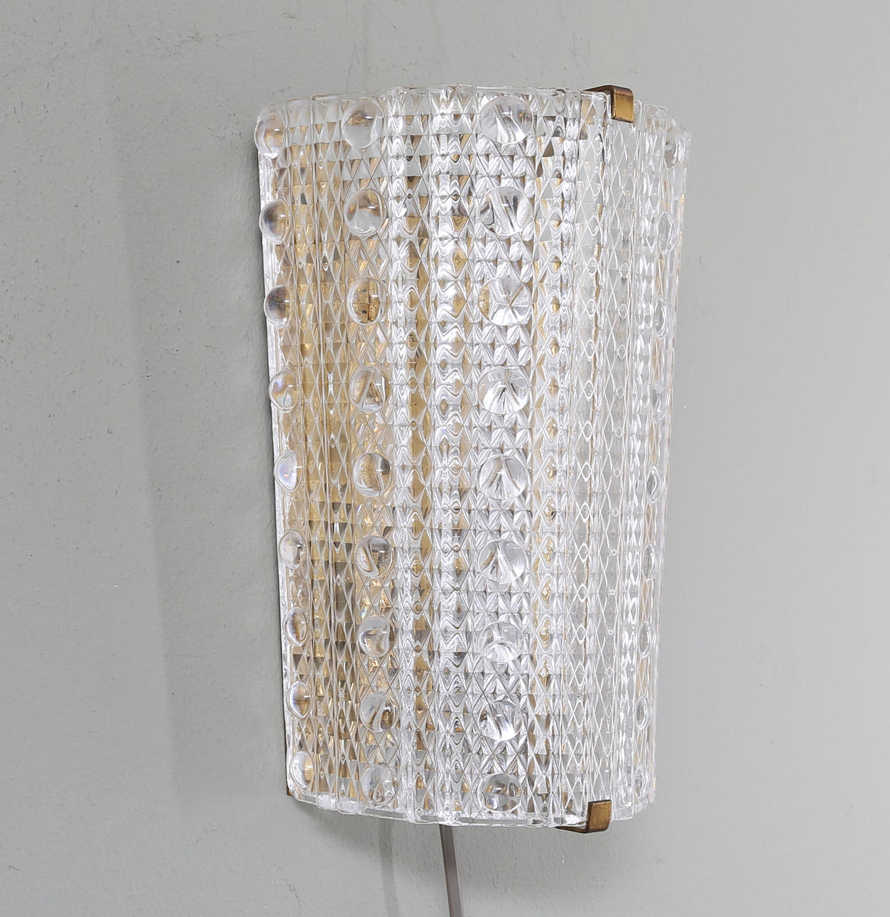 VÄGGLAMPETT, glas och mässing, Carl Fagerlund, Orrefors.