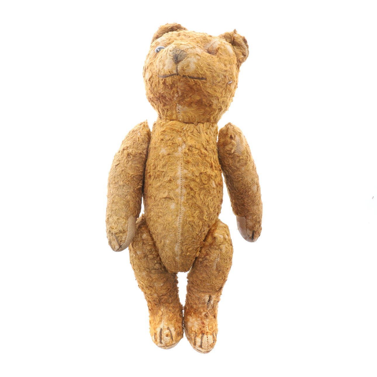 A VINTAGE PLUSH JOINTED TEDDY BEAR.
