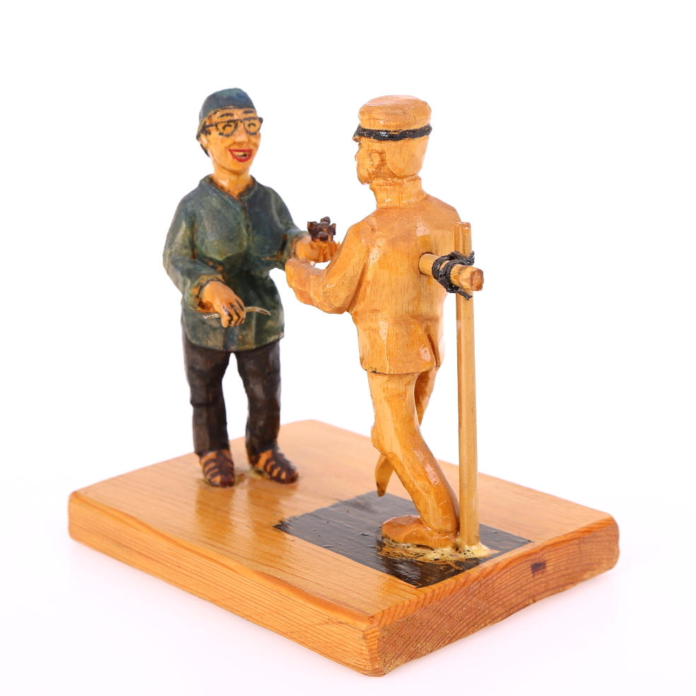 JAN HÅKANSSON. Figur i trä, Wanja och Skaradjäknen, monogramsignerad.