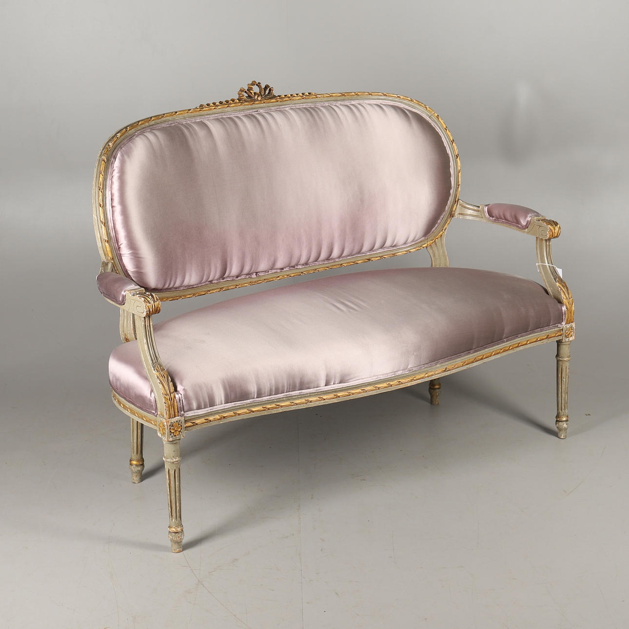 A FRENCH LOUIS XVI STYLE SETTEE.