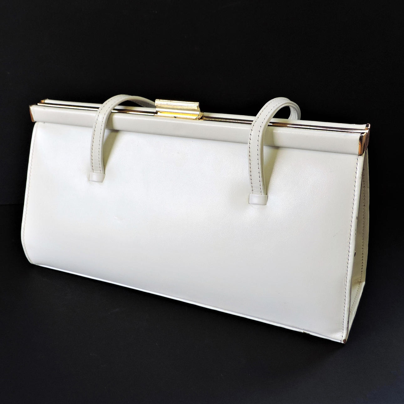 BOLSO DE MANO DE PIEL L.TAUMAN LTD.