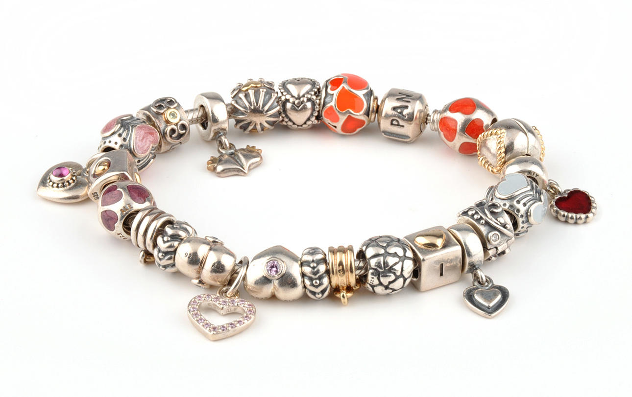 PANDORA BRACELET with 24 pendants, approx. 85g.