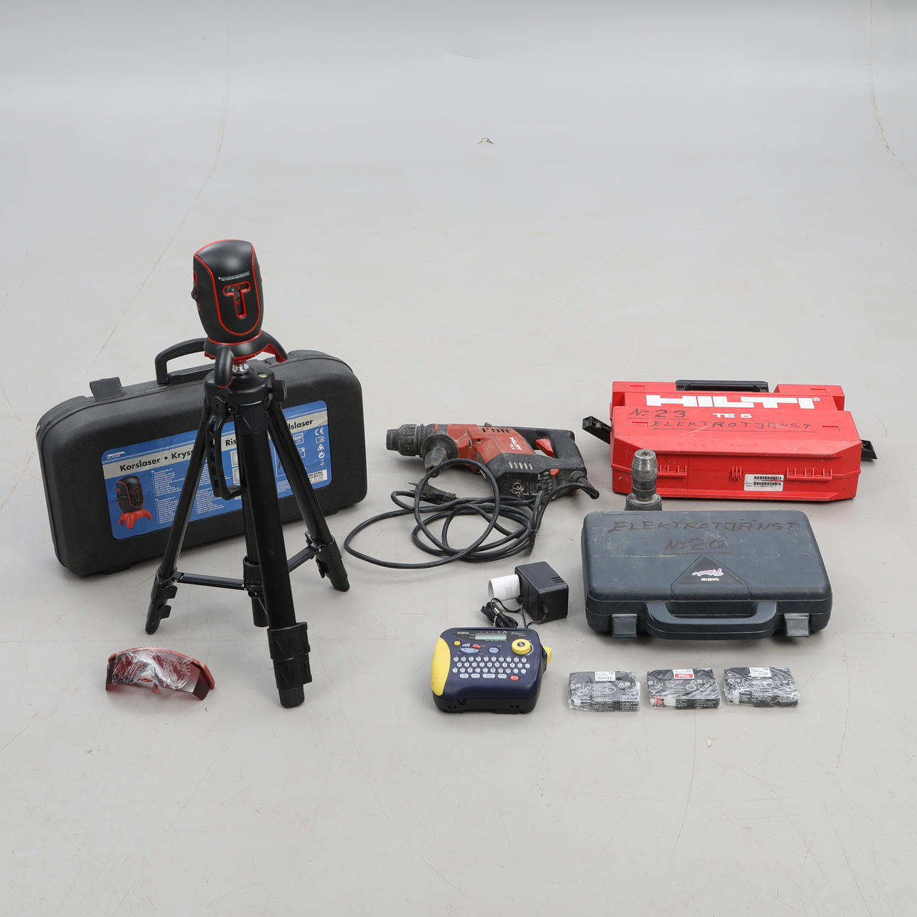 HILTI impact drill, cross laser and label maker.