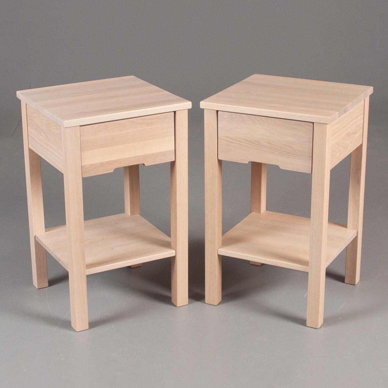 Jensen Plania bedside tables, a pair, white-stained oak.