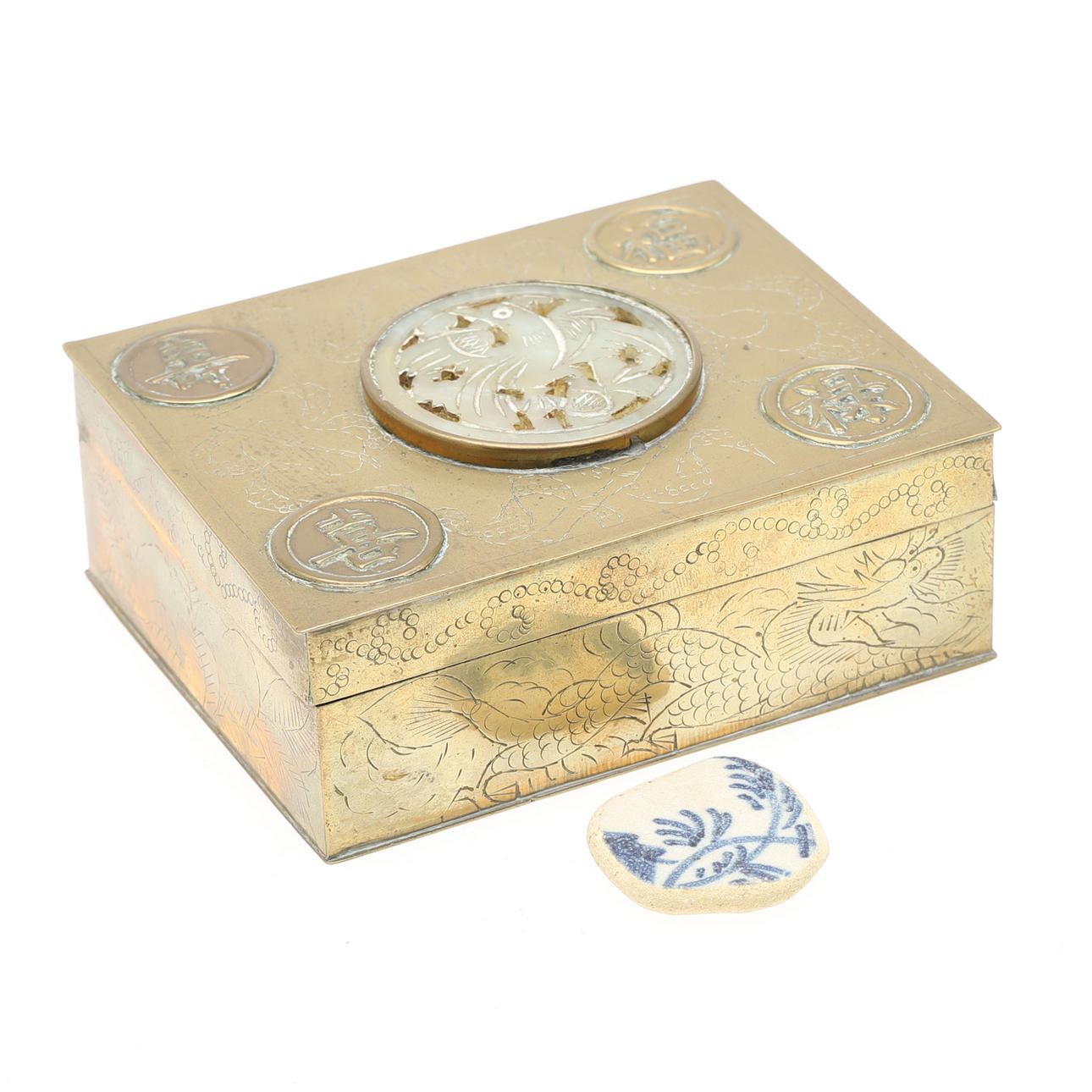 A CHINESE BRASS FACED CIGARETTE BOX.