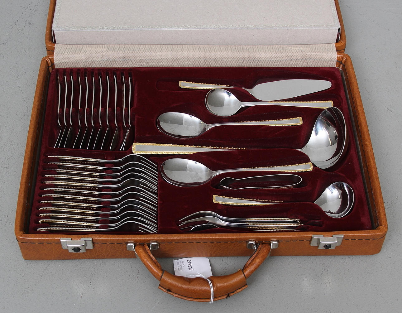 BESTICK, rostfritt, förgylld dekor, Soligen.