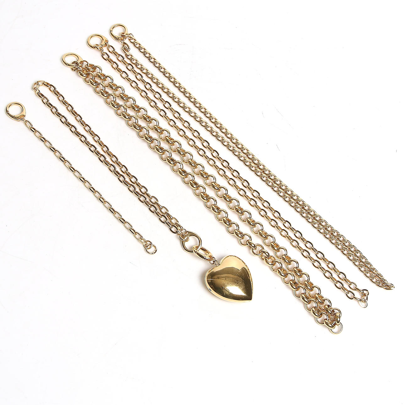 HALSBAND, MEDALJONG samt ARMBAND, 6 delar, gulmetall. Vikt 375 gram. 1900-talets andra hälft.