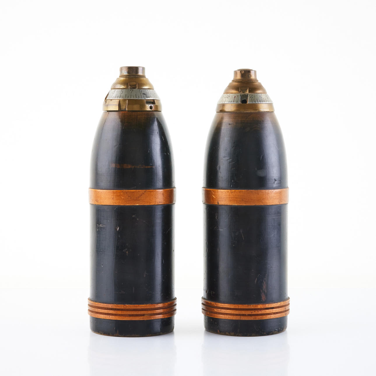 PRACTICE GRENADES, exercise grenade, representational grenade with heavy impact tube m/1885 alternatively m/1887, stained and bronzed book, closure in bronze.