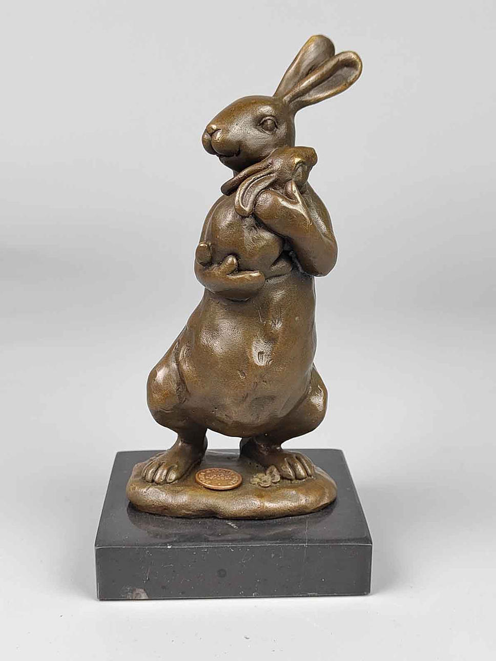 BRONZE RABBIT ON MARBLE BASE.