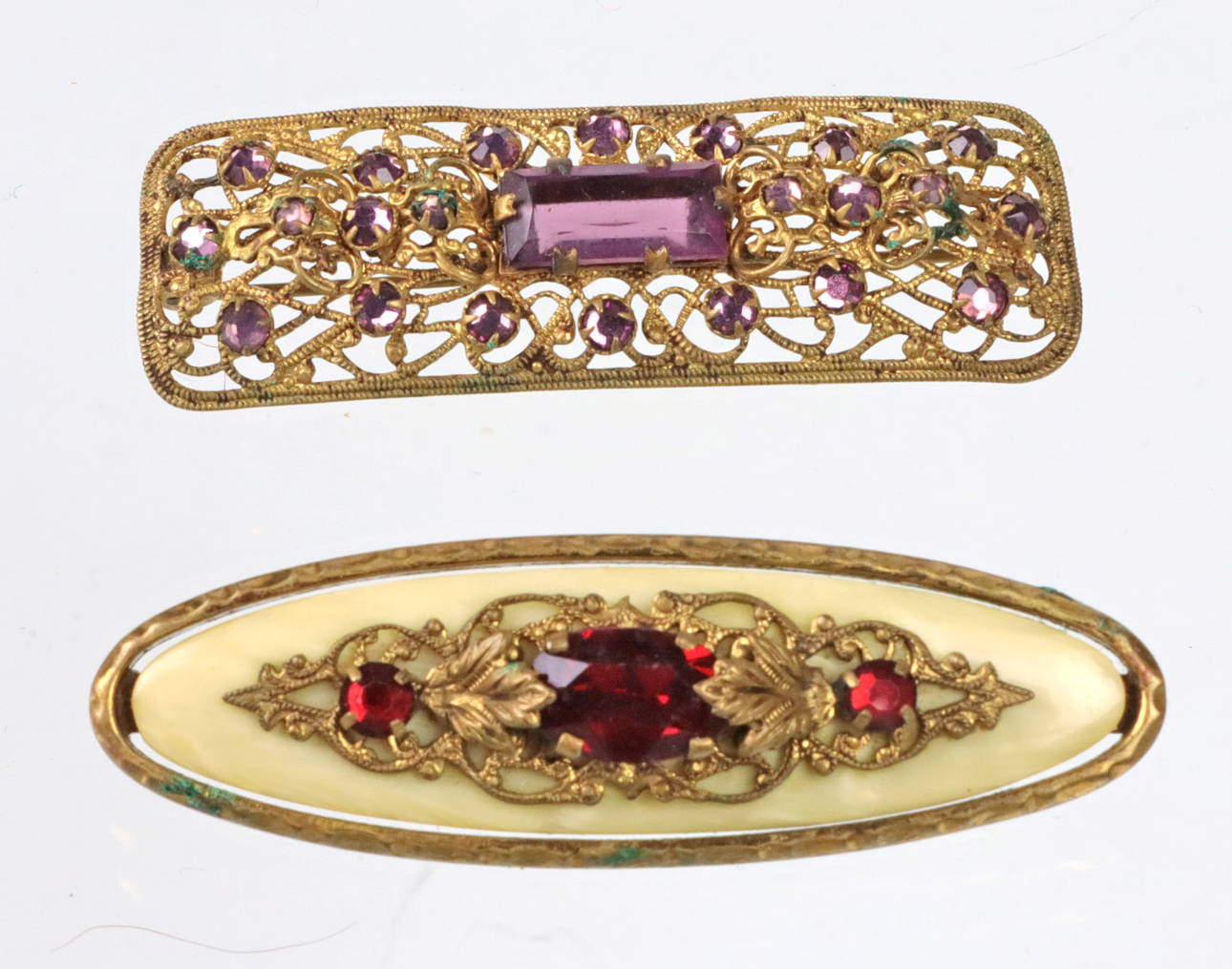 2 broches antiguos de la década de 1930.