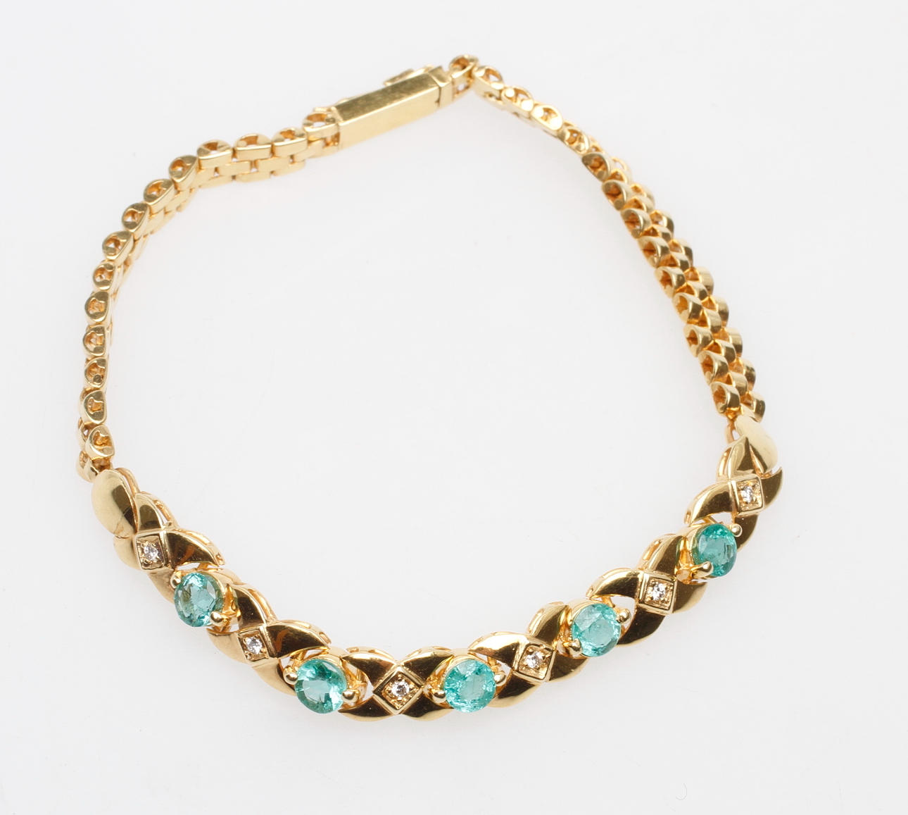 ARMBAND med små diamanter samt gröna stenar, 18k guld, vikt ca 16,4 gr.