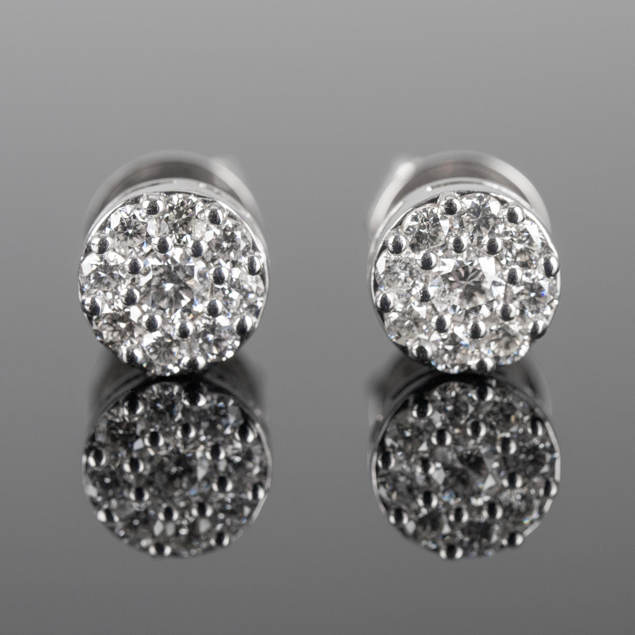 Stud earrings with diamonds.