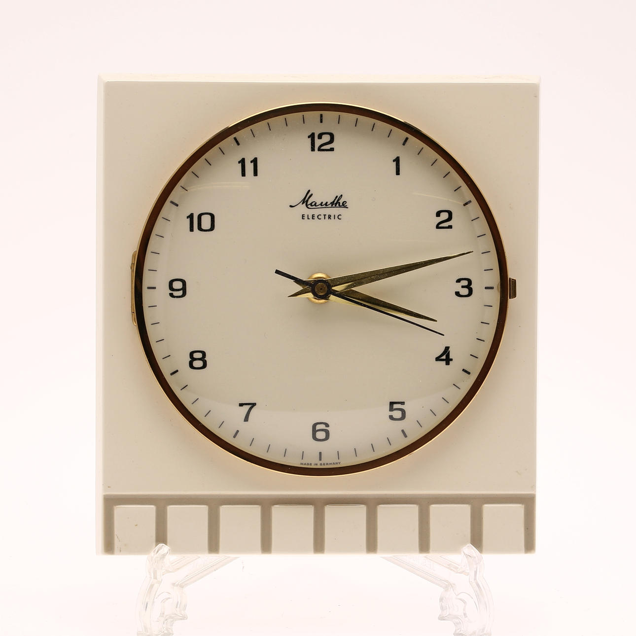 WALL CLOCK, ceramic, Mauthe electric, Germany, mid 20th century.