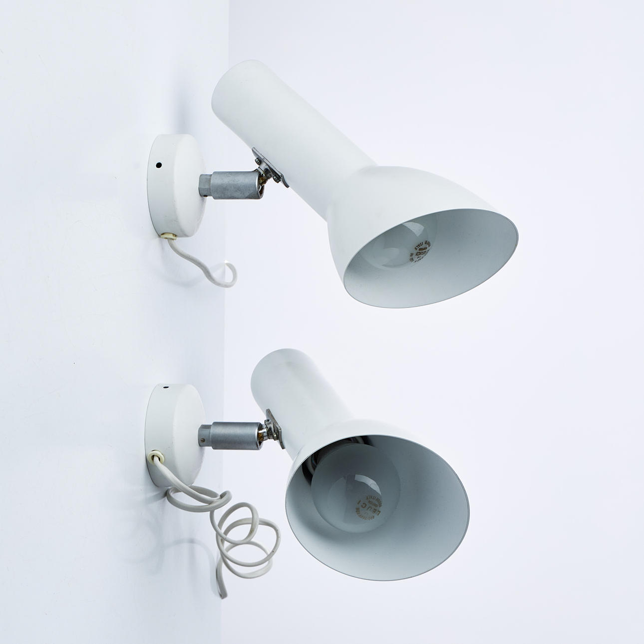 VÄGGLAMPOR, 1 par, Obelique, Design Tom Stepp.