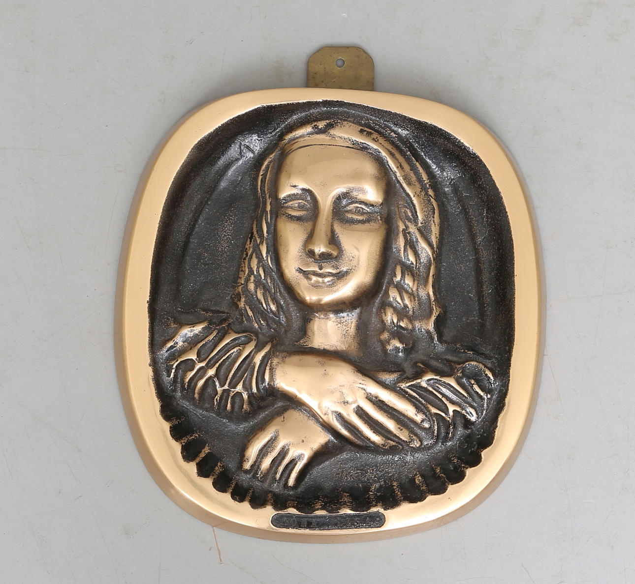 ÅKE EVAN KARLSSON. Väggrelief, brons, Mona Lisa, signerad.