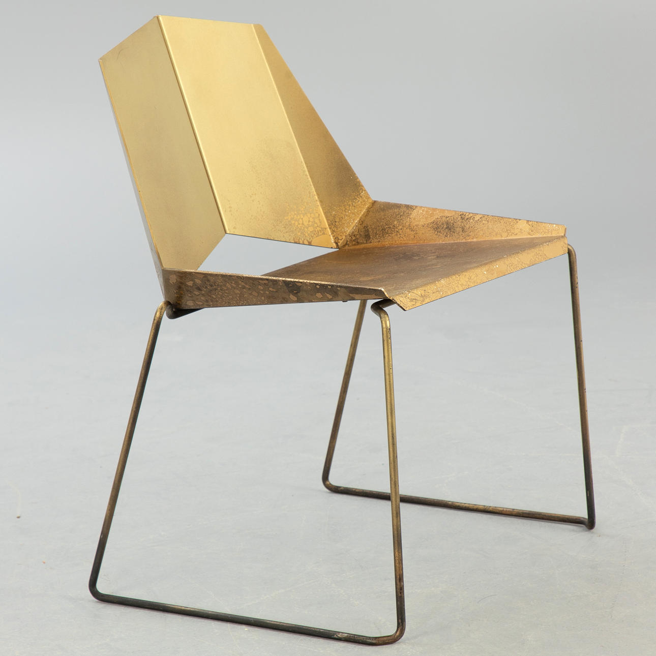 Driade, sheet metal chair, gold.