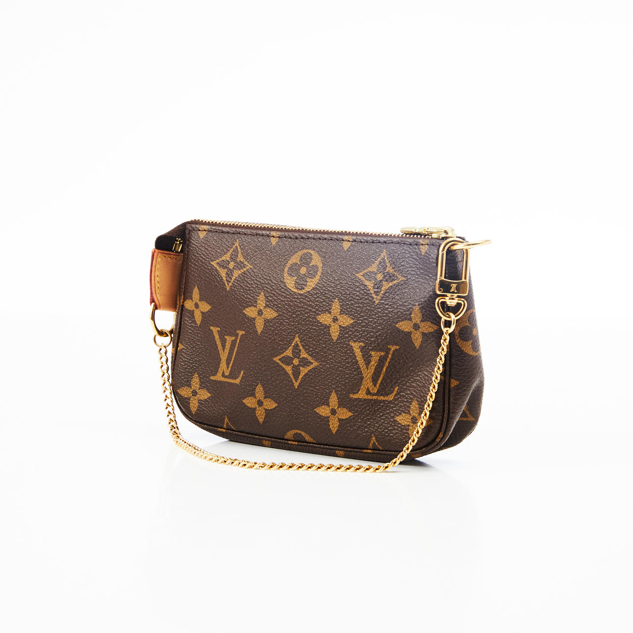 LOUIS VUITTON, "Mini Pochette" with monogram pattern and yellow metal link handle.