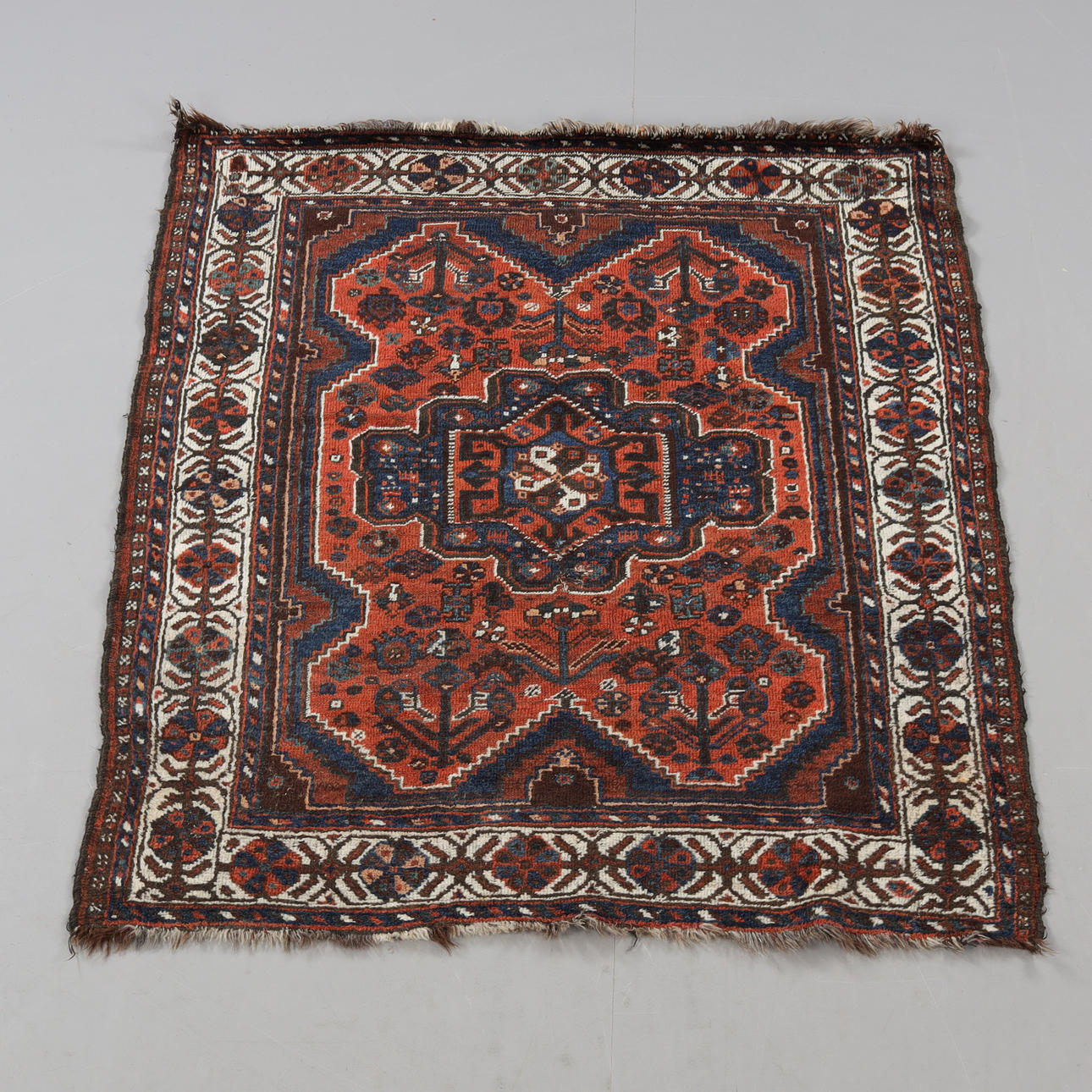 CARPET, probably Caucasian, measures approx. 113 x 151 cm.