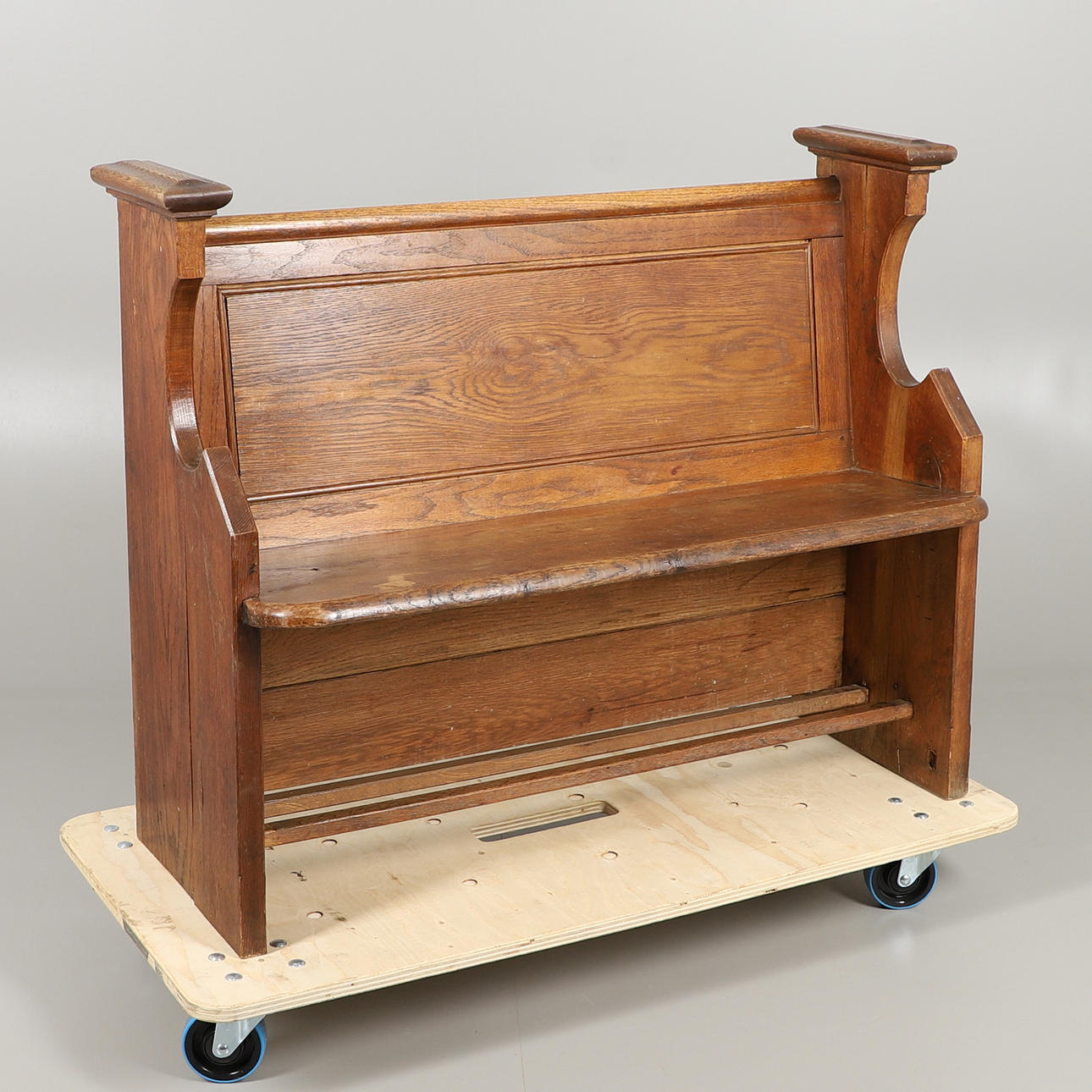 A SMALL ANTIQUE PINE CHURCH PEW.