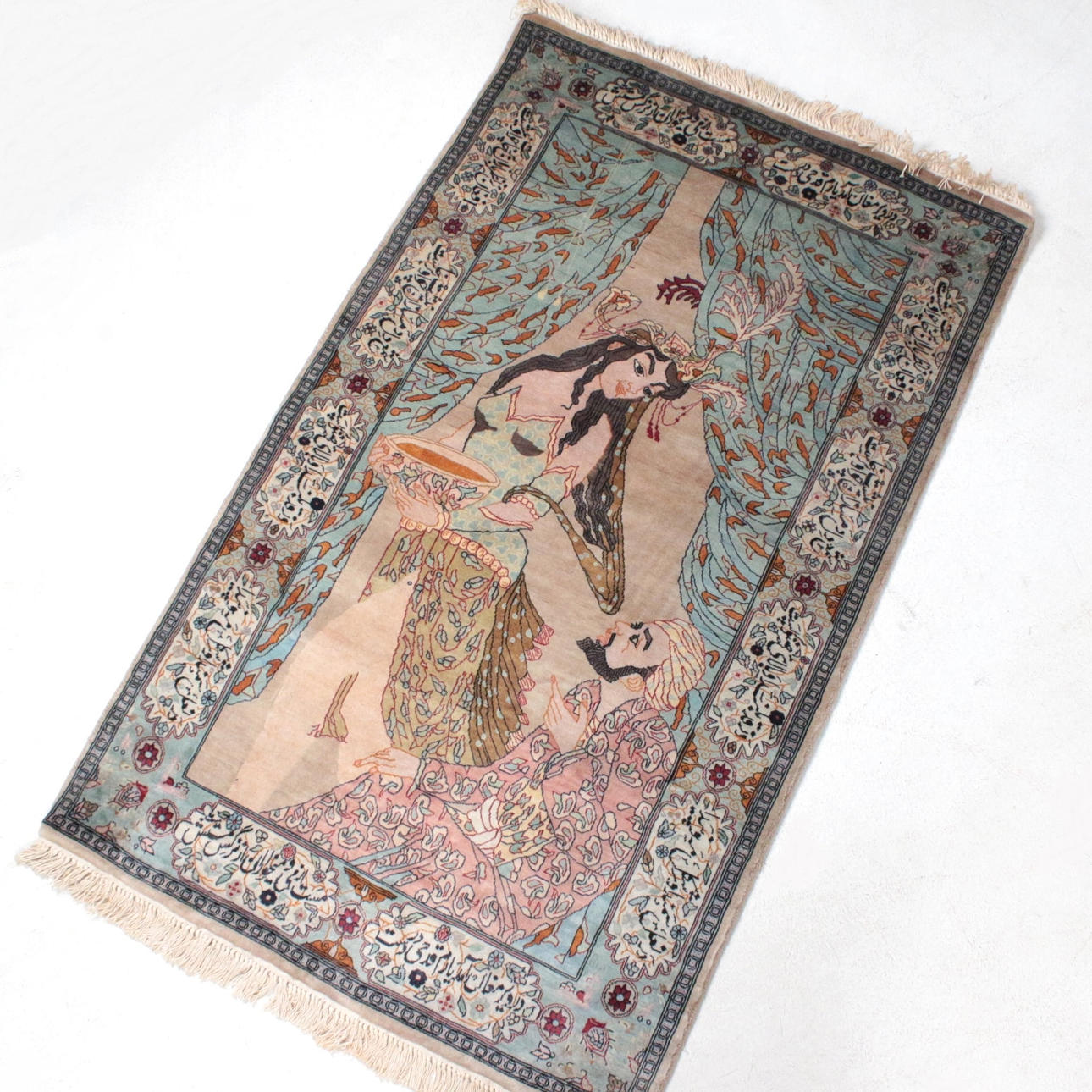 Orientalisk matta med dikt, siden.