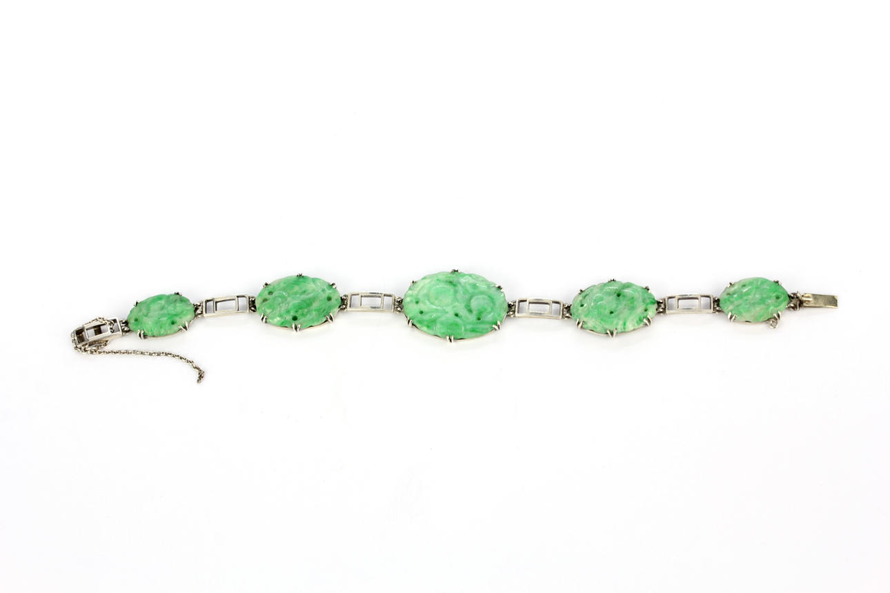 CARVED JADE WHITE METAL BRACELET.