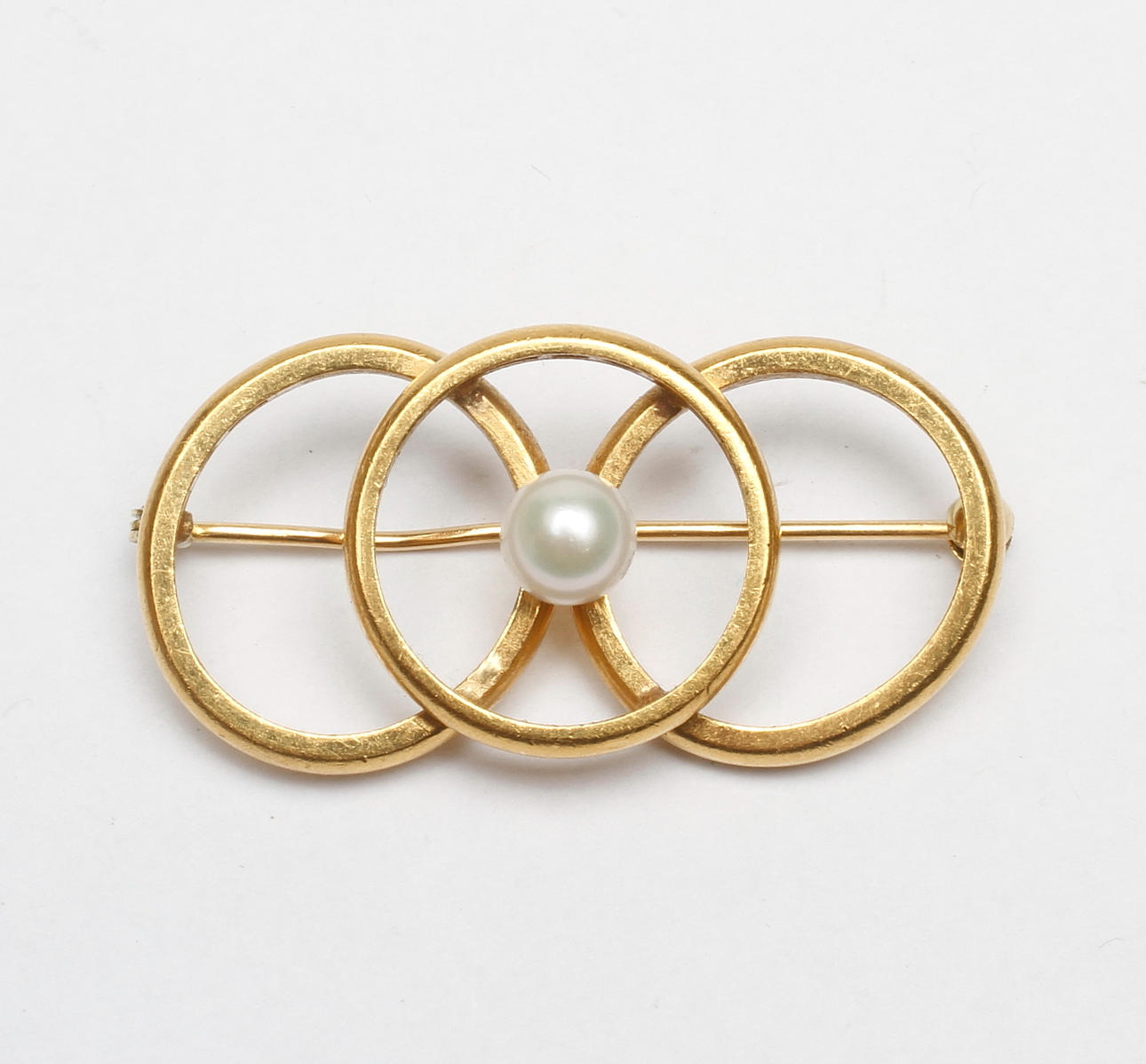 BROSCH, 23k guld, vikt ca 16,8 gr.