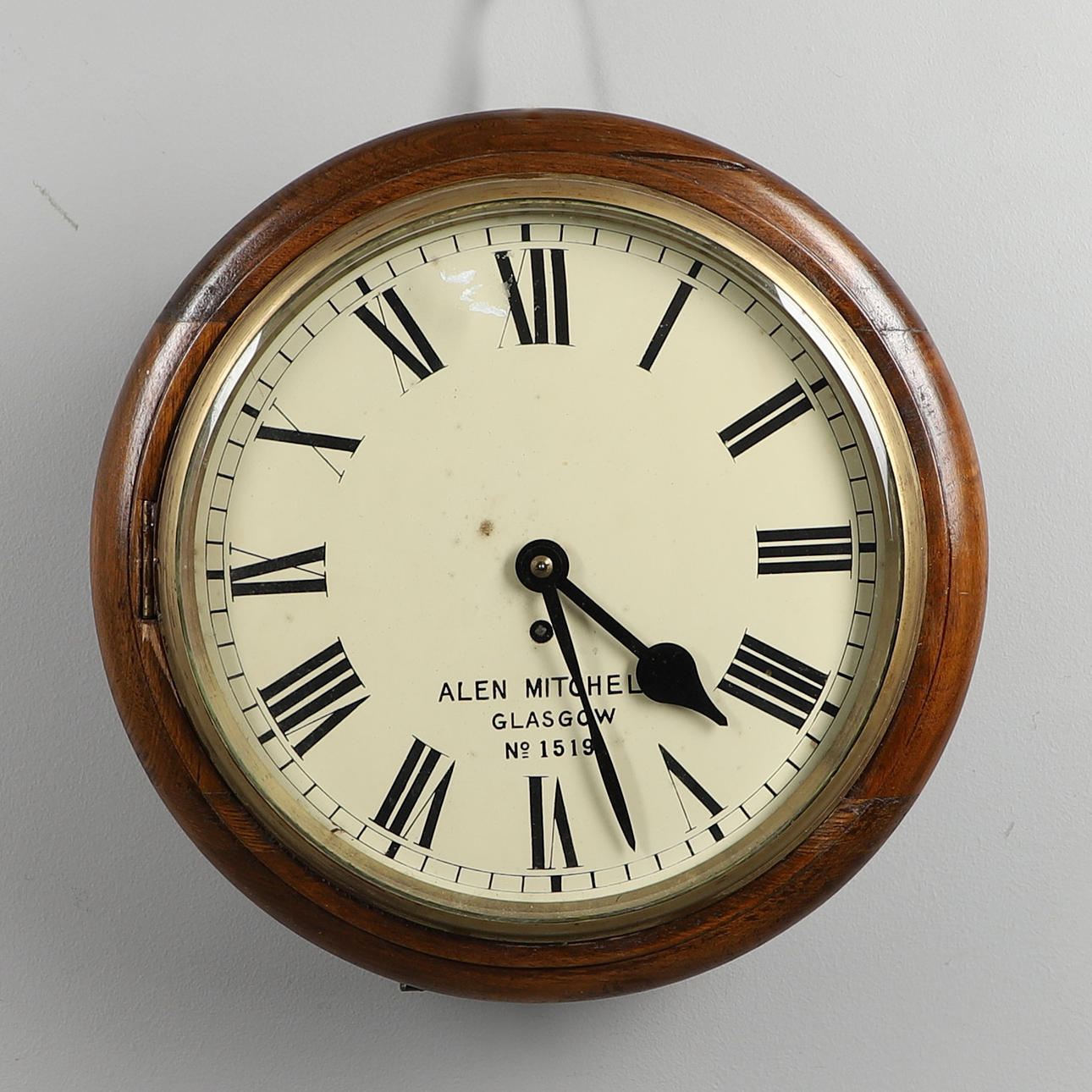 A REPRODUCTION OAK RAILWAY STATION CLOCK.
